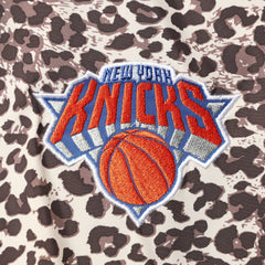 New York Knicks DKNY Sport Women's Gabriella Windbreaker Half-Zip Hoodie Leopard