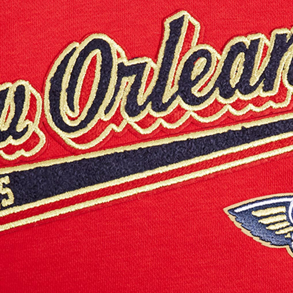 New Orleans Pelicans Pro Standard Women's Script Tail Cropped Pullover Hoodie Red