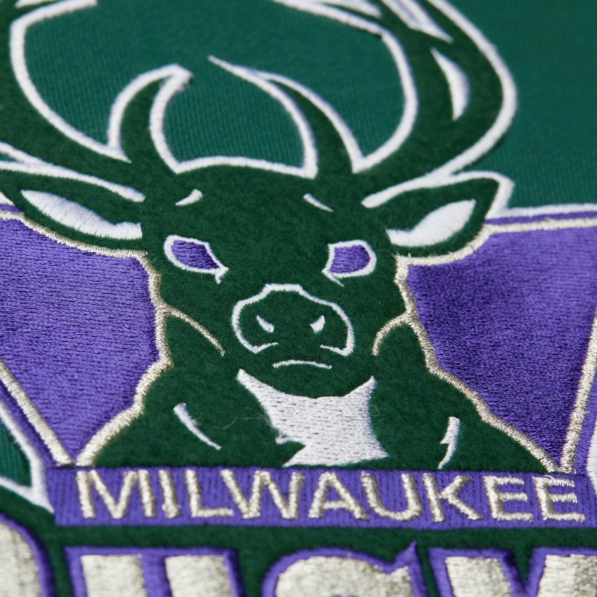 Milwaukee Bucks Hardwood Classics Team Origins Fleece Pullover Hoodie Hunter Green